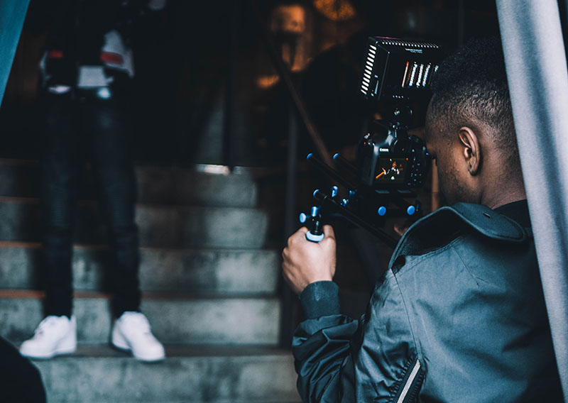 _black_man_with_camera